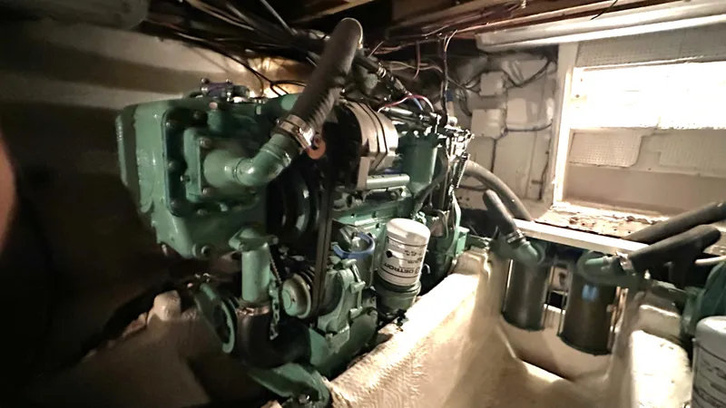 Slide: The Image of Engine room of a 1972 Bristol 42 Offshore Trawler, showcasing mechanical components. - 28