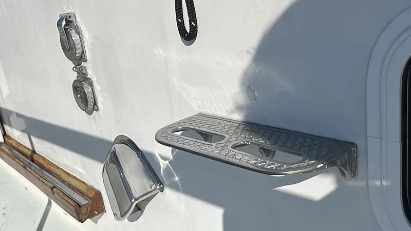 Slide: The Image of 1972 Bristol 42 Offshore Trawler deck details with metal fixtures and step. - 40
