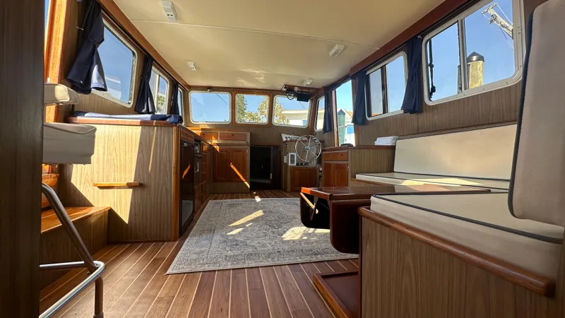 Slide: The Image of Interior of 1972 Bristol 42 Offshore Trawler with wood paneling and seating. - 6
