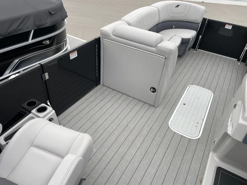 Slide: The Image of 2024 Starcraft SLS 5 boat interior with gray seating and flooring. - 11