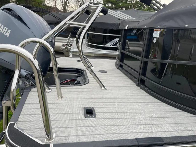 Slide: The Image of 2024 Starcraft SLS 5 boat deck with Yamaha engine and sleek design. - 4