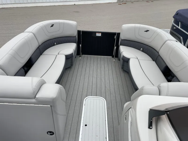 Slide: The Image of 2024 Starcraft SLS 5 boat interior with gray seating and flooring. - 8