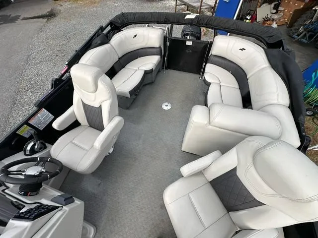 Slide: The Image of 2021 Starcraft SLS 1 boat interior with plush seating and modern design. - 3