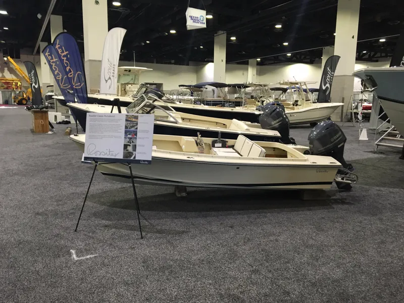 Slide: The Image of 2016 Rossiter Shoreline 14 boat displayed at an indoor exhibition. - 25