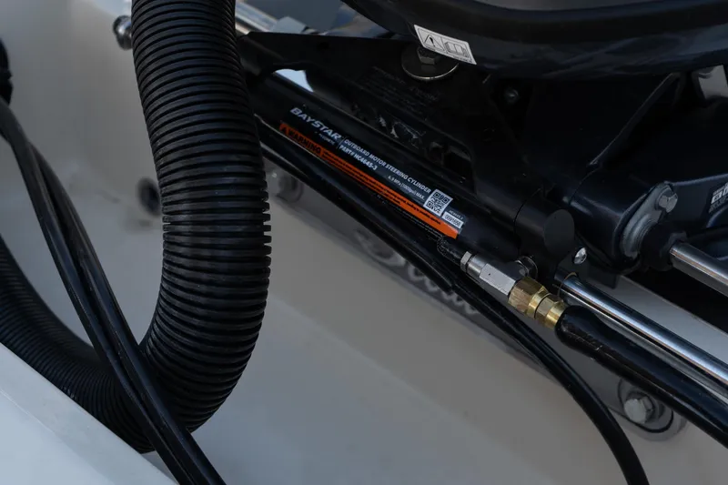 Slide: The Image of Close-up of 2025 Scout 195 Sportfish boat engine components. - 23