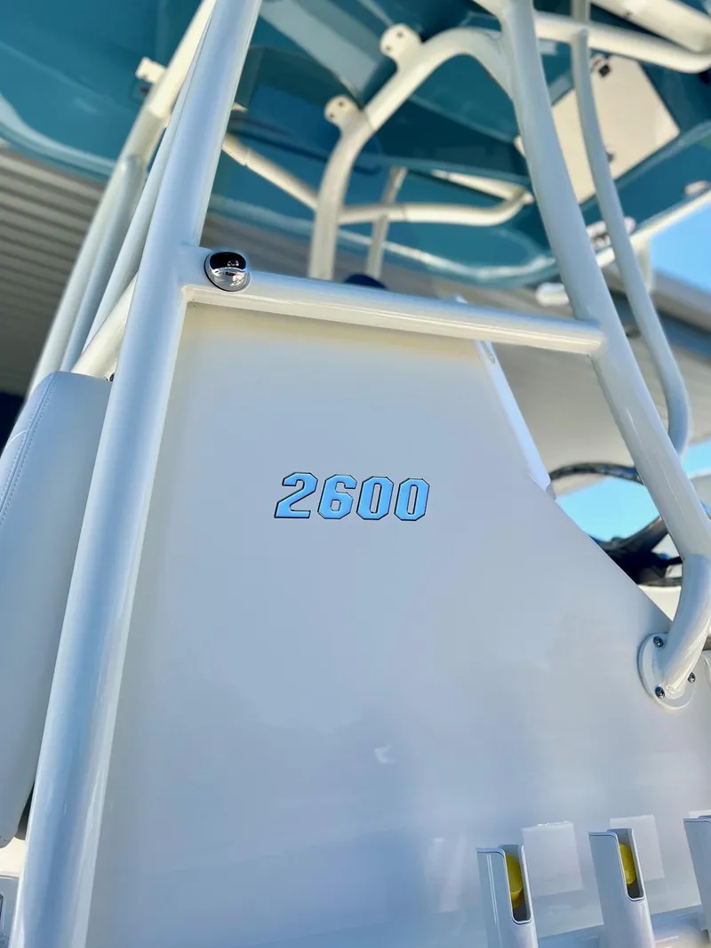 Slide: The Image of Close-up of 2025 Pathfinder 2600 TRS boat detail with blue accents. - 9
