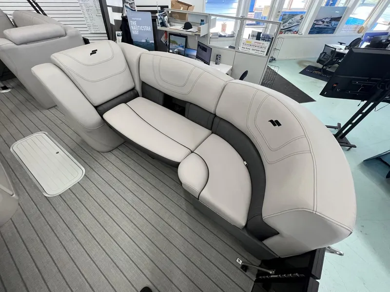 Slide: The Image of 2023 Starcraft CX 25 DL BAR boat interior with sleek, modern seating design. - 6