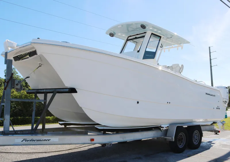 The Image of 2025 World Cat 260 CC-X boat on trailer, side view. - 0