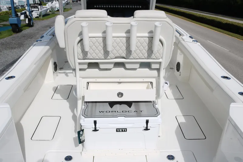 Slide: The Image of 2025 World Cat 260 CC-X boat interior with seating and storage. - 12