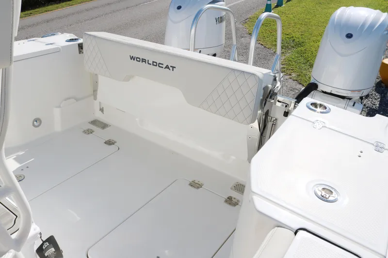 Slide: The Image of 2025 World Cat 260 CC-X boat deck with dual engines, white finish. - 13