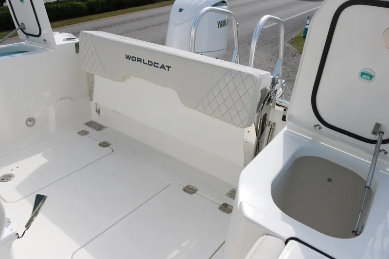 Slide: The Image of 2025 World Cat 260 CC-X boat interior with seating and storage compartments. - 14