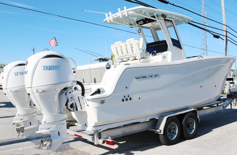 Slide: The Image of 2025 World Cat 260 CC-X boat on trailer with twin Yamaha engines. - 3