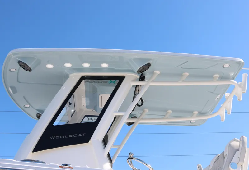 Slide: The Image of 2025 World Cat 260 CC-X boat canopy against clear blue sky. - 5