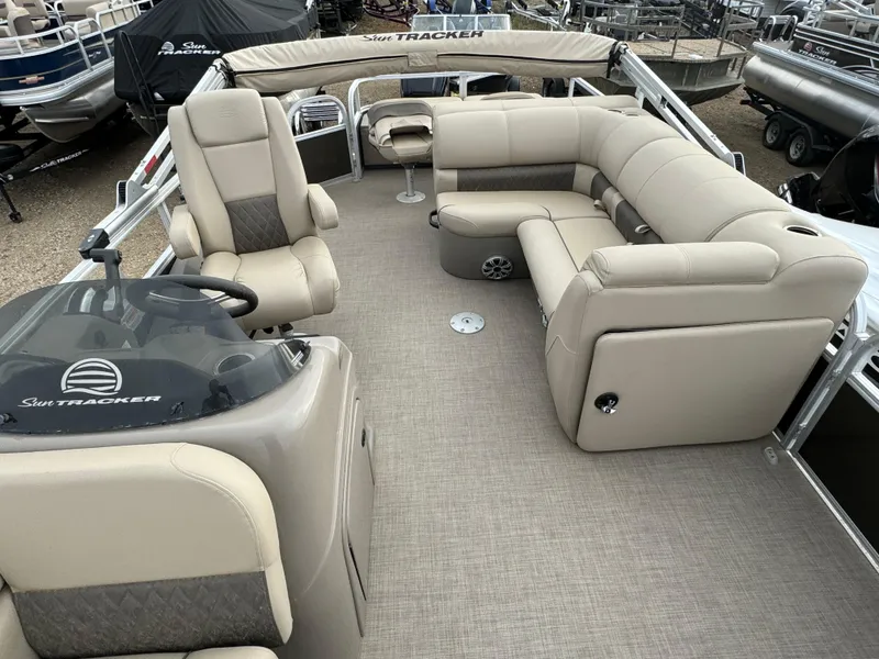 Slide: The Image of 2023 Sun Tracker SportFish 22 DLX pontoon boat with spacious seating and modern design. - 8