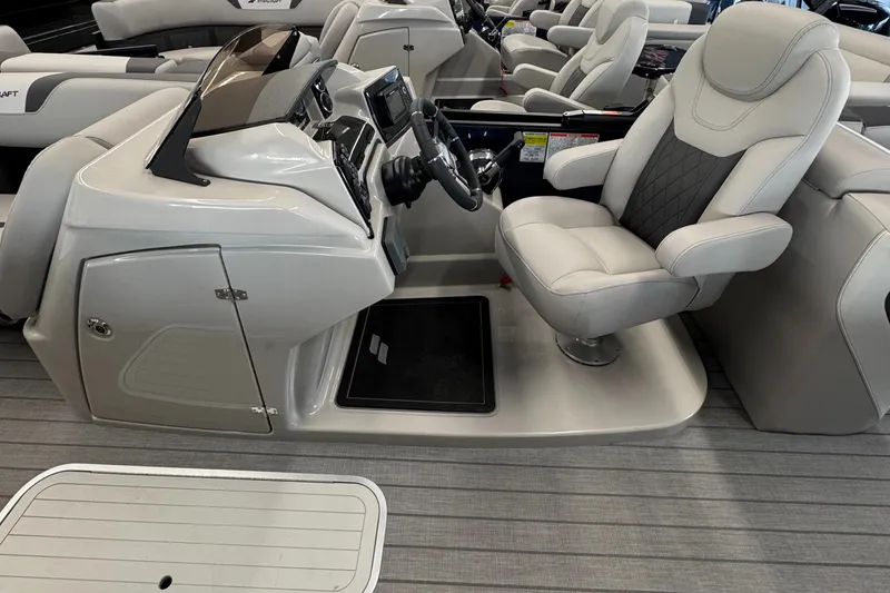Slide: The Image of 2025 Starcraft SLS 3 boat interior with captain's chair and control panel. - 4