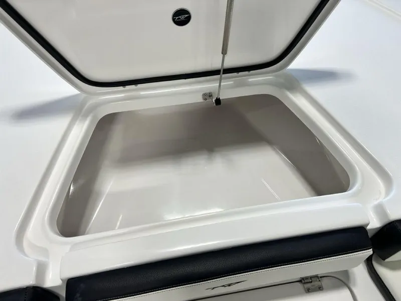 Slide: The Image of Open storage compartment on 2025 Tidewater 2300 Carolina Bay boat. - 7