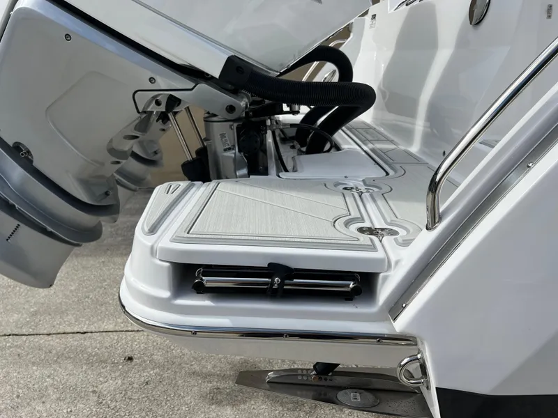 Slide: The Image of 2025 Blackfin 272 CC boat engine platform detail with sleek design and modern features. - 30