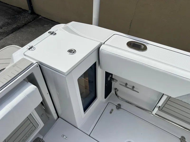 Slide: The Image of 2025 Blackfin 272 CC boat interior, featuring sleek white design and modern fittings. - 37