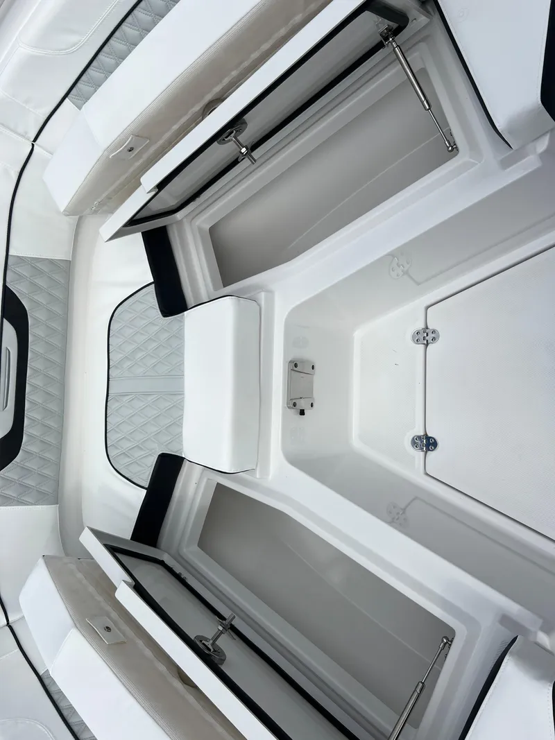 Slide: The Image of 2025 Blackfin 272 CC boat interior storage compartments. - 5