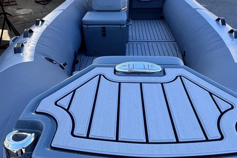 Slide: The Image of 2025 Highfield Classic 460 boat interior with sleek seating and modern design. - 9