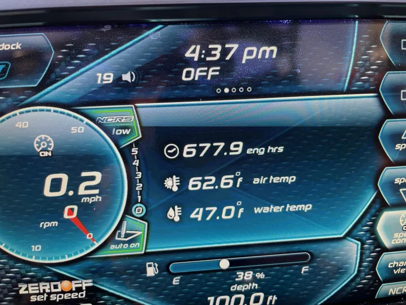Slide: The Image of Dashboard of 2015 Nautique Super Air G23 showing engine hours, air and water temperature. - 13