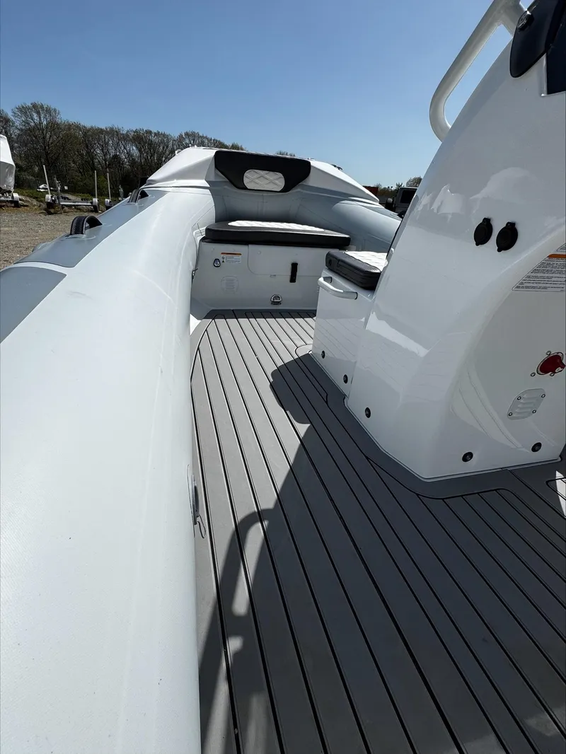 Slide: The Image of 2025 Highfield Sport 420 boat interior with sleek design and modern features. - 12