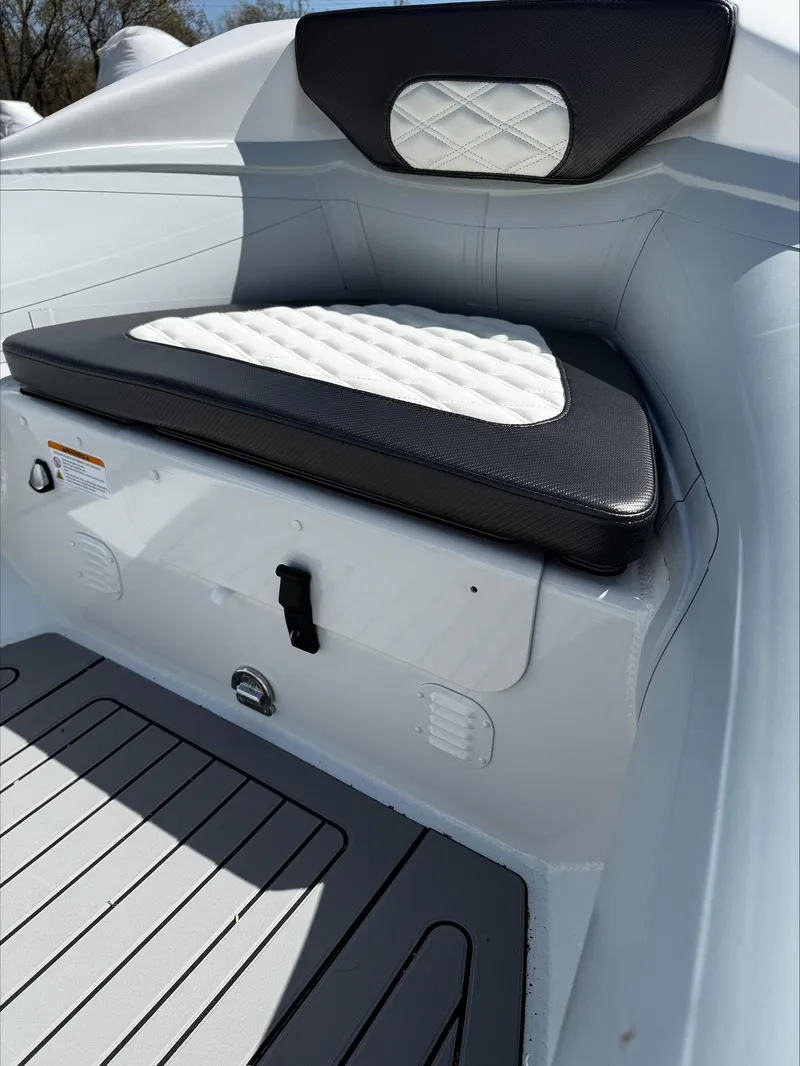 Slide: The Image of 2025 Highfield Sport 420 boat interior with cushioned seating and sleek design. - 15