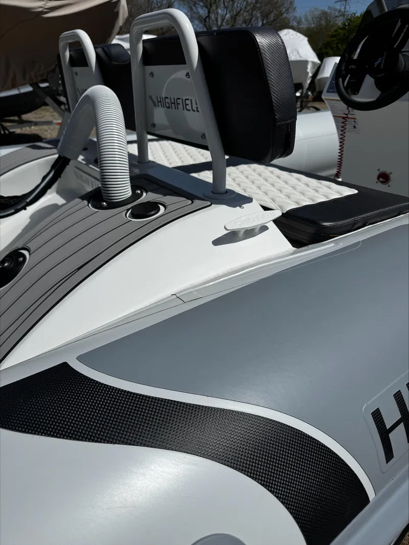 Slide: The Image of 2025 Highfield Sport 420 boat interior with sleek design and modern features. - 18