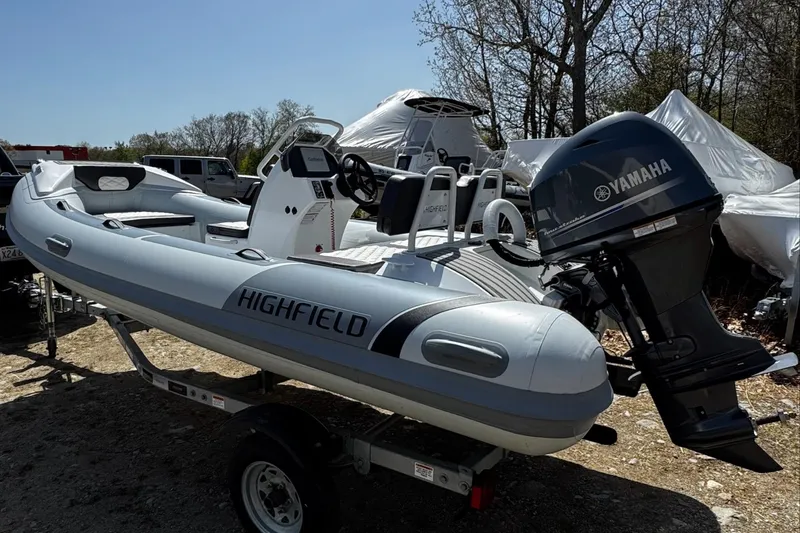 Slide: The Image of 2025 Highfield Sport 420 inflatable boat with Yamaha outboard motor on a trailer. - 20