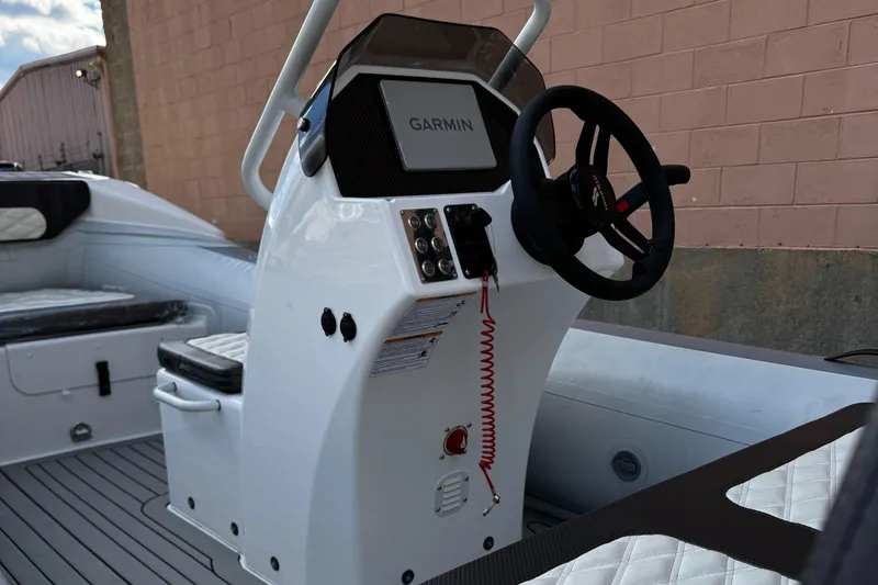 Slide: The Image of 2025 Highfield Sport 420 boat console with Garmin navigation system. - 3