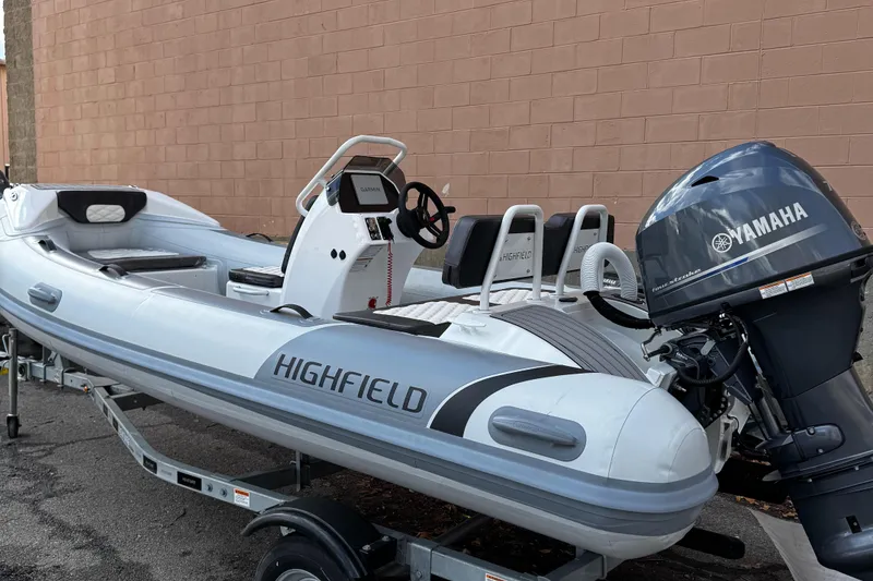 Slide: The Image of 2025 Highfield Sport 420 boat with Yamaha engine on a trailer. - 5
