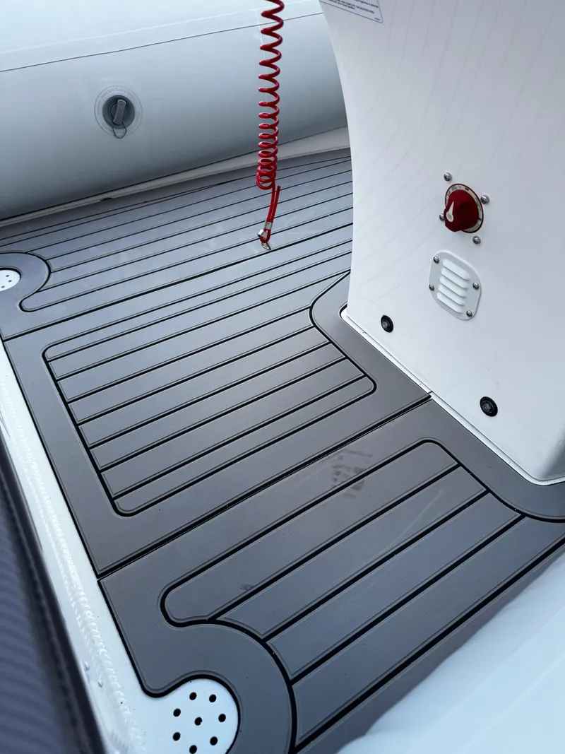 Slide: The Image of 2025 Highfield Sport 420 boat deck with sleek, modern design and durable flooring. - 9