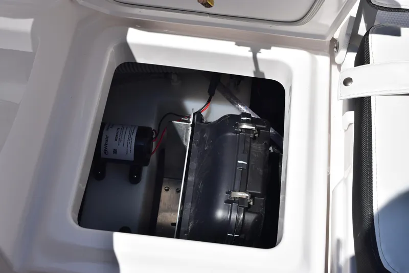Slide: The Image of 2025 Yamaha Boats 255 FSH Sport E battery compartment detail. - 24