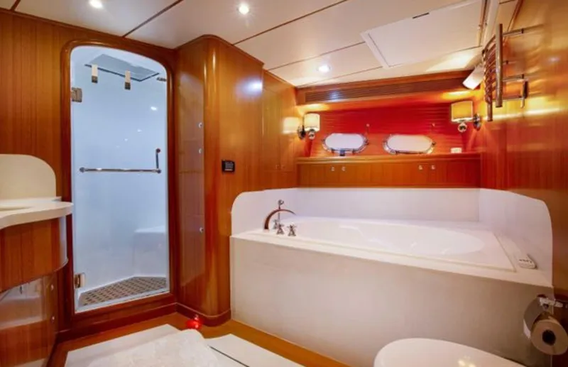 Slide: The Image of Luxurious bathroom in 2009 Nordhavn 76 yacht with wood paneling and modern fixtures. - 18