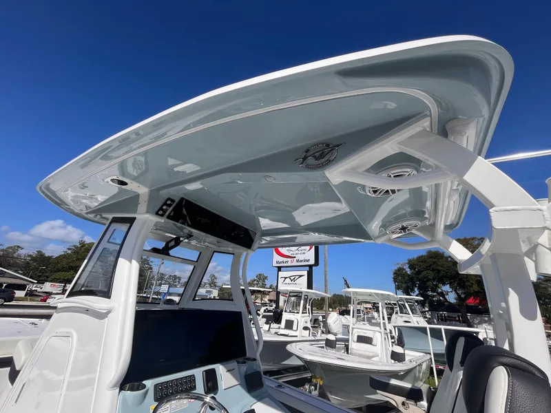 Slide: The Image of 2025 Tidewater 3100 Carolina Bay boat with sleek design and modern features. - 18