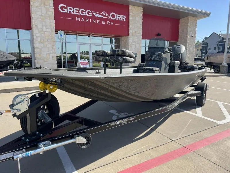 Slide: The Image of 2025 War Eagle 961 Blackhawk boat on trailer at Gregg Orr Marine & RV dealership. - 1