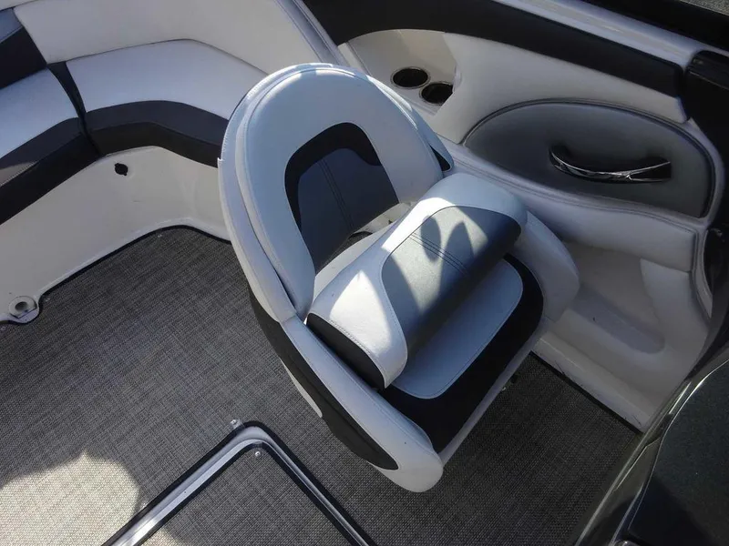 Slide: The Image of 2021 Monterey 224FS boat interior with sleek seating and modern design. - 12