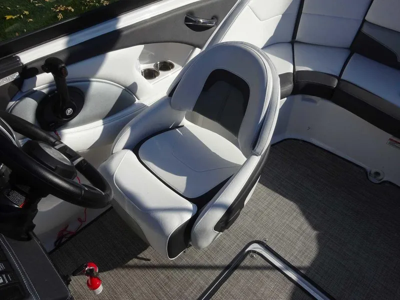 Slide: The Image of 2021 Monterey 224FS boat interior with sleek seating and modern design. - 8