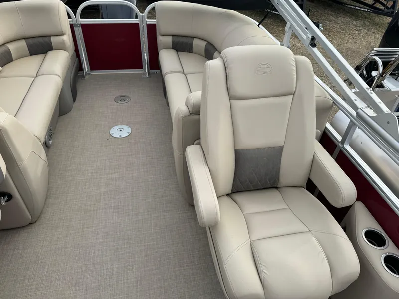 Slide: The Image of 2022 Sun Tracker Party Barge 22 XP3 interior with beige seating and spacious layout. - 11