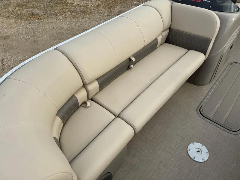 Slide: The Image of 2022 Sun Tracker Party Barge 22 XP3 beige seating area on a pontoon boat. - 6
