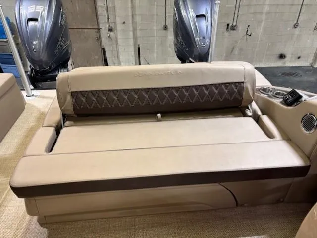 Slide: The Image of 2021 Bennington QX 30 QXSBWA X2 boat interior seating with beige upholstery. - 10