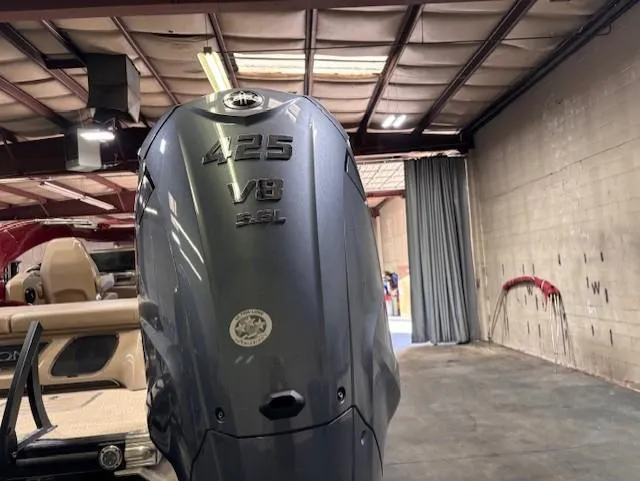 Slide: The Image of 2021 Bennington QX 30 with 425 V8 engine in a warehouse setting. - 5