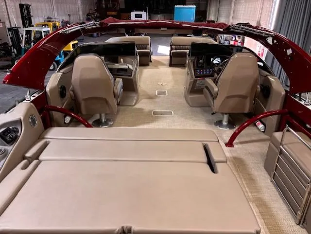 Slide: The Image of 2021 Bennington QX 30 QXSBWA X2 Wide Beam interior with luxurious seating and helm. - 8