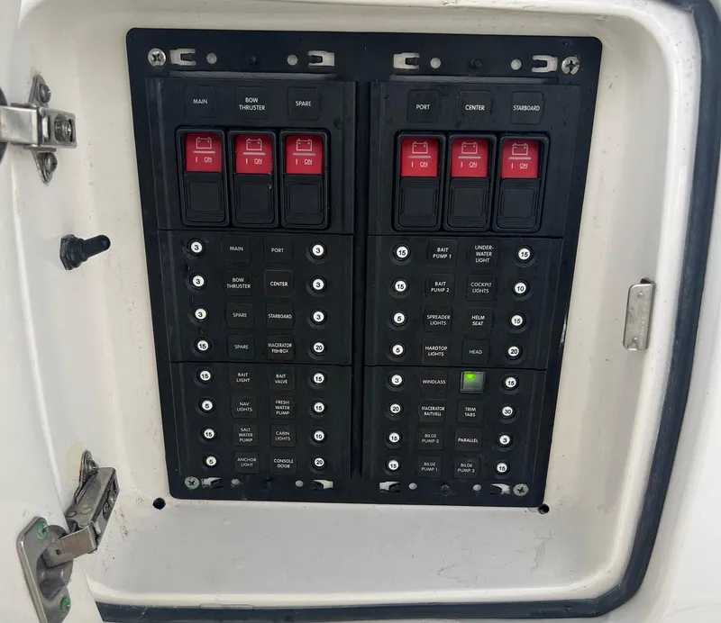 Slide: The Image of Electrical panel on a 2016 Intrepid 400 Center Console boat. - 14