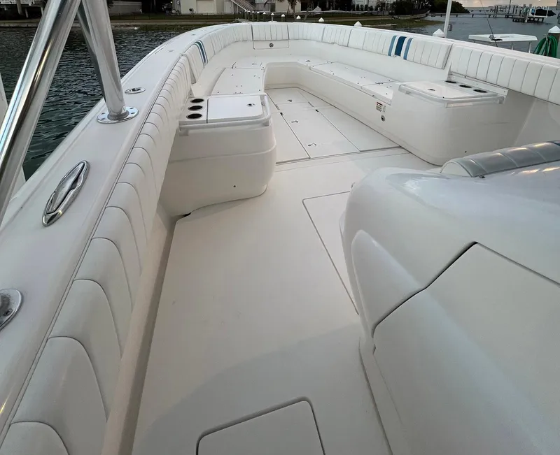 Slide: The Image of 2016 Intrepid 400 Center Console boat interior with spacious seating and sleek design. - 15