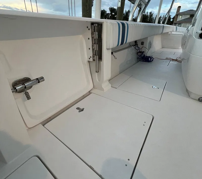 Slide: The Image of 2016 Intrepid 400 Center Console boat interior with white deck and seating. - 36