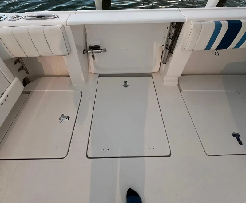 Slide: The Image of 2016 Intrepid 400 Center Console boat deck with storage compartments. - 37