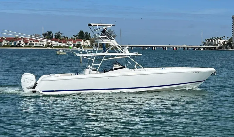 Slide: The Image of 2016 Intrepid 400 Center Console boat cruising on a sunny day. - 46