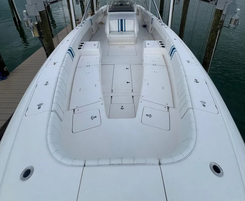 Slide: The Image of 2016 Intrepid 400 Center Console boat with spacious deck and seating. - 6