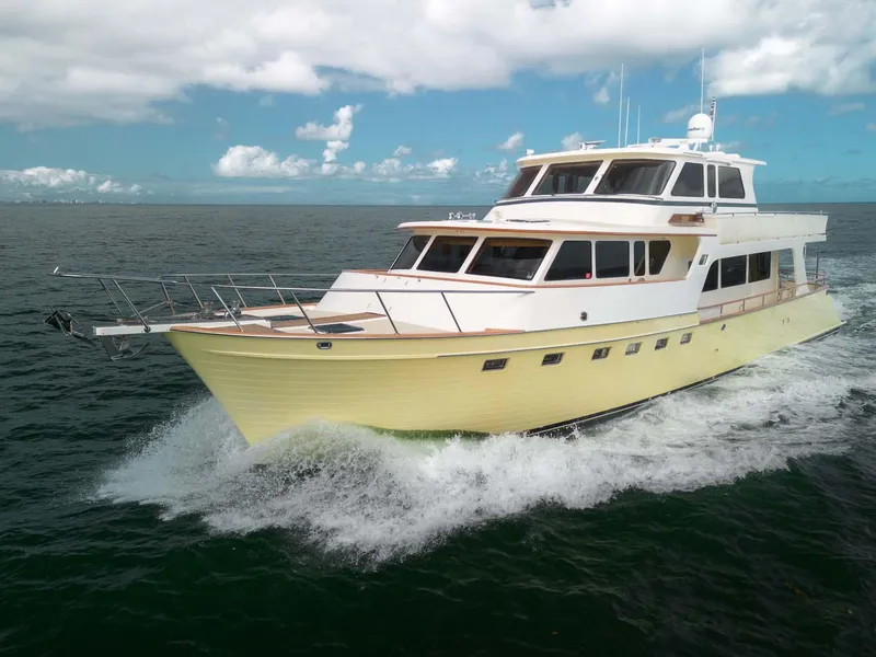 The Image of Luxury 2006 Marlow 72E LRC yacht cruising on open water. - 0